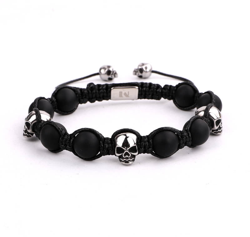 Pulsera cuencas negras y calaveras P11039